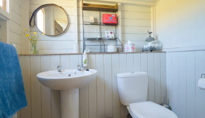 Bathrooms with properr toilets and hot running water